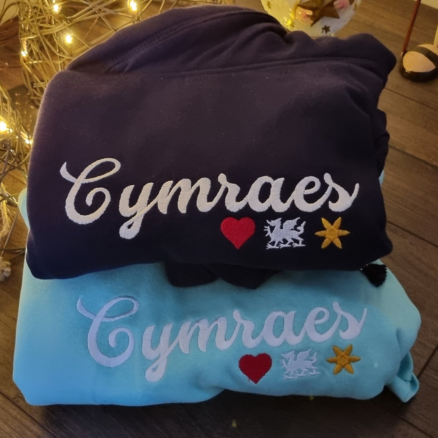 Cymraes Cross-Neck Hoodie – the perfect Welsh-inspired gift for any proud Welsh woman.