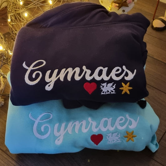 Cymraes Cross-Neck Hoodie – the perfect Welsh-inspired gift for any proud Welsh woman.