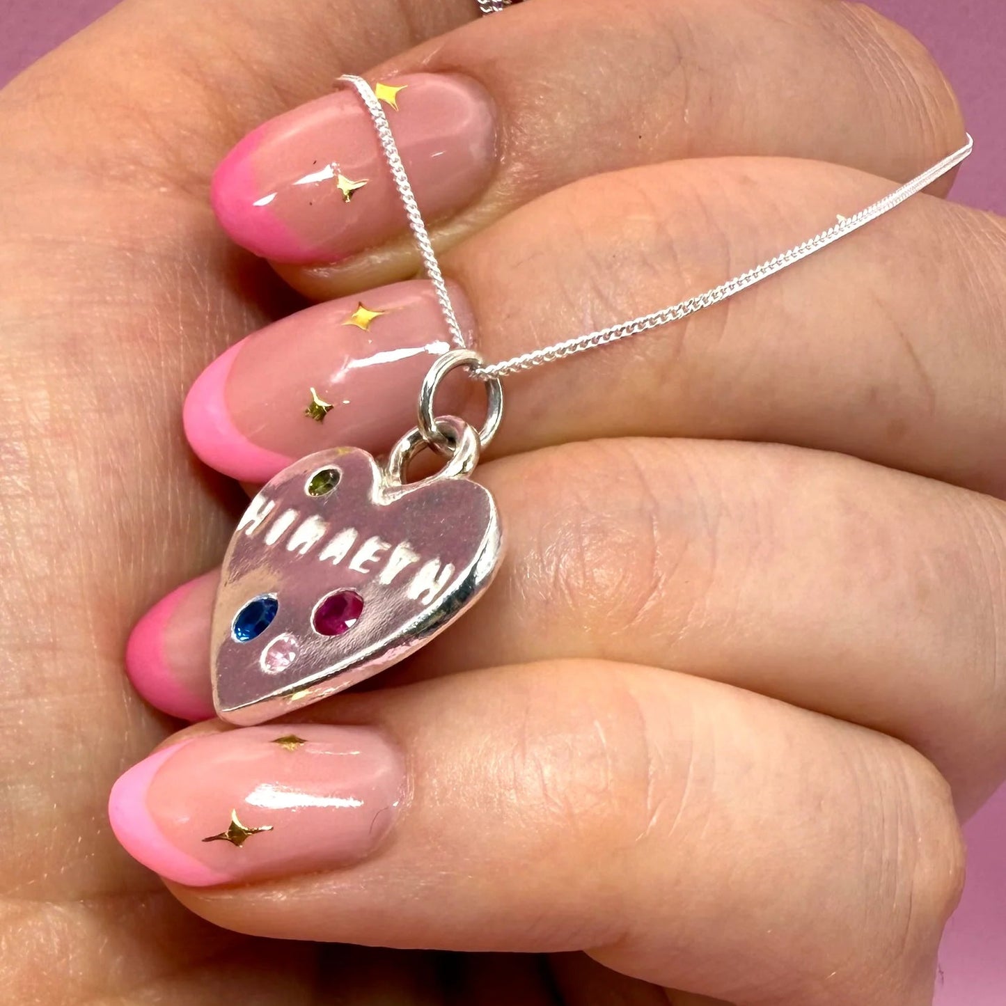 Handmade Hiraeth Welsh Heart Necklace in solid fine silver, with colourful gemstones made in Wales, perfect for gifting or celebrating Welsh heritage.