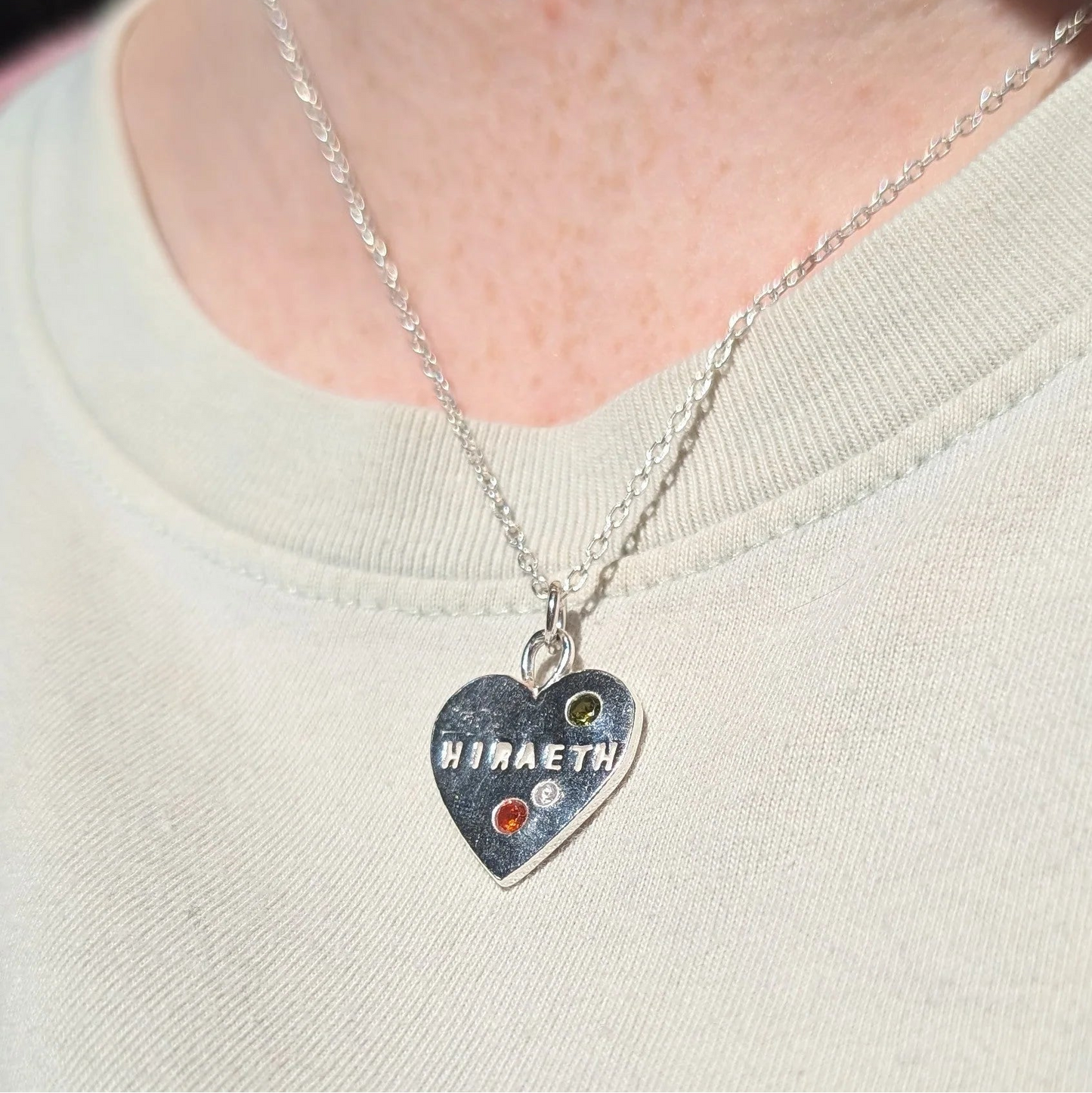 Hiraeth Welsh Heart Necklace displayed on a model, handmade in Wales, perfect Christmas or Valentine’s Day present or gift for her.