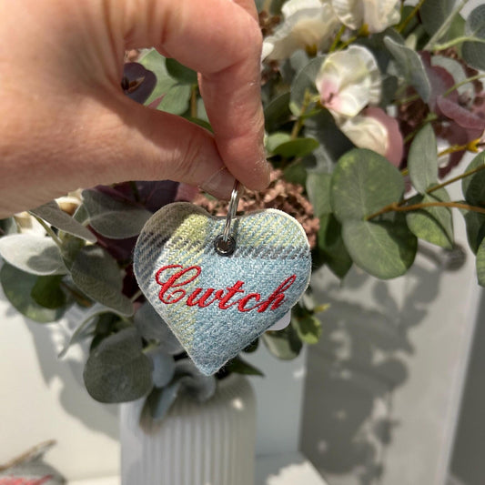 Handmade Welsh heart keyring embroidered with “Cwtch” in red thread, unique Welsh textile gift accessory for birthdays, Christmas, weddings