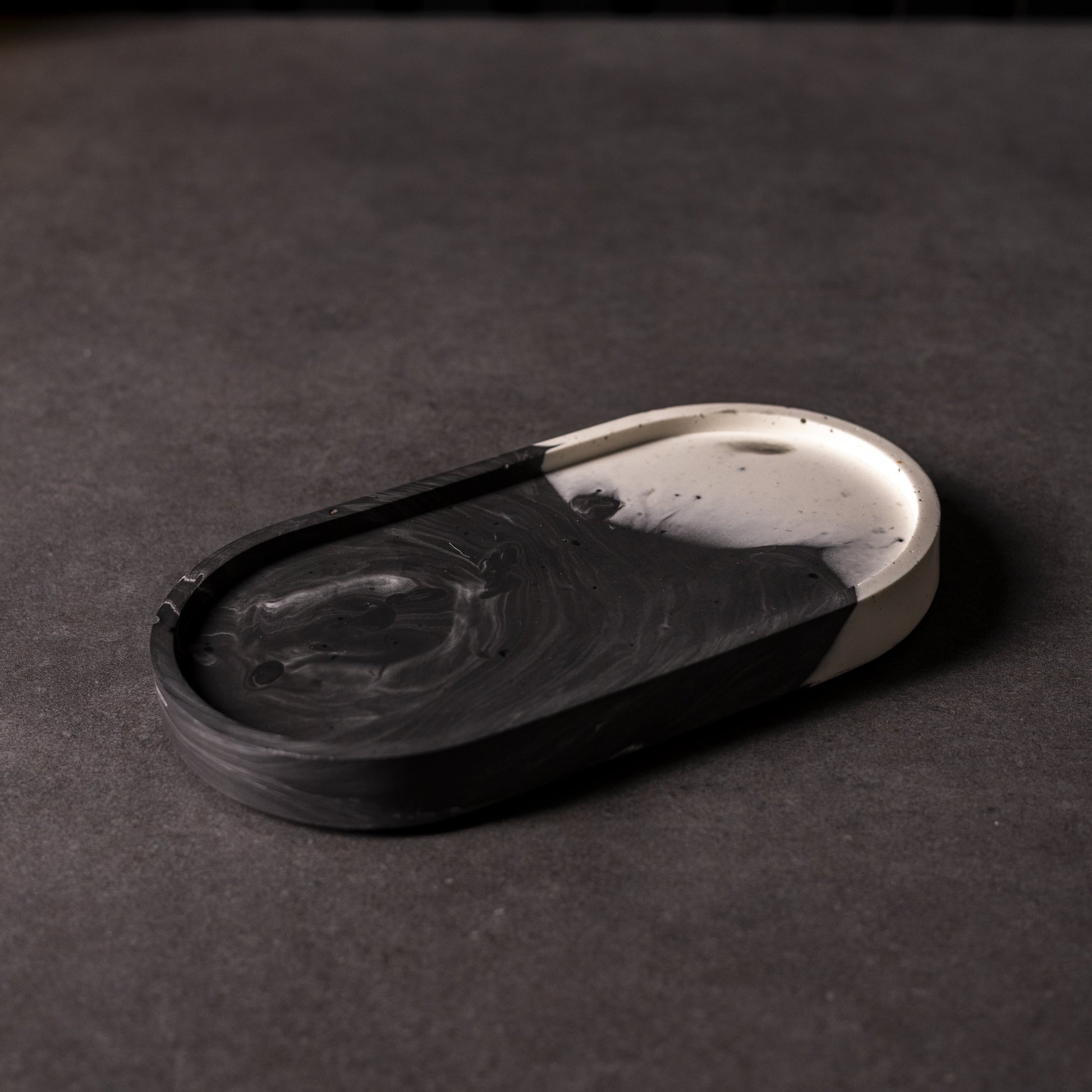 Black and white marbled oval Jesmonite trinket trays in different colours, handcrafted in Wales, perfect for gifting or home décor