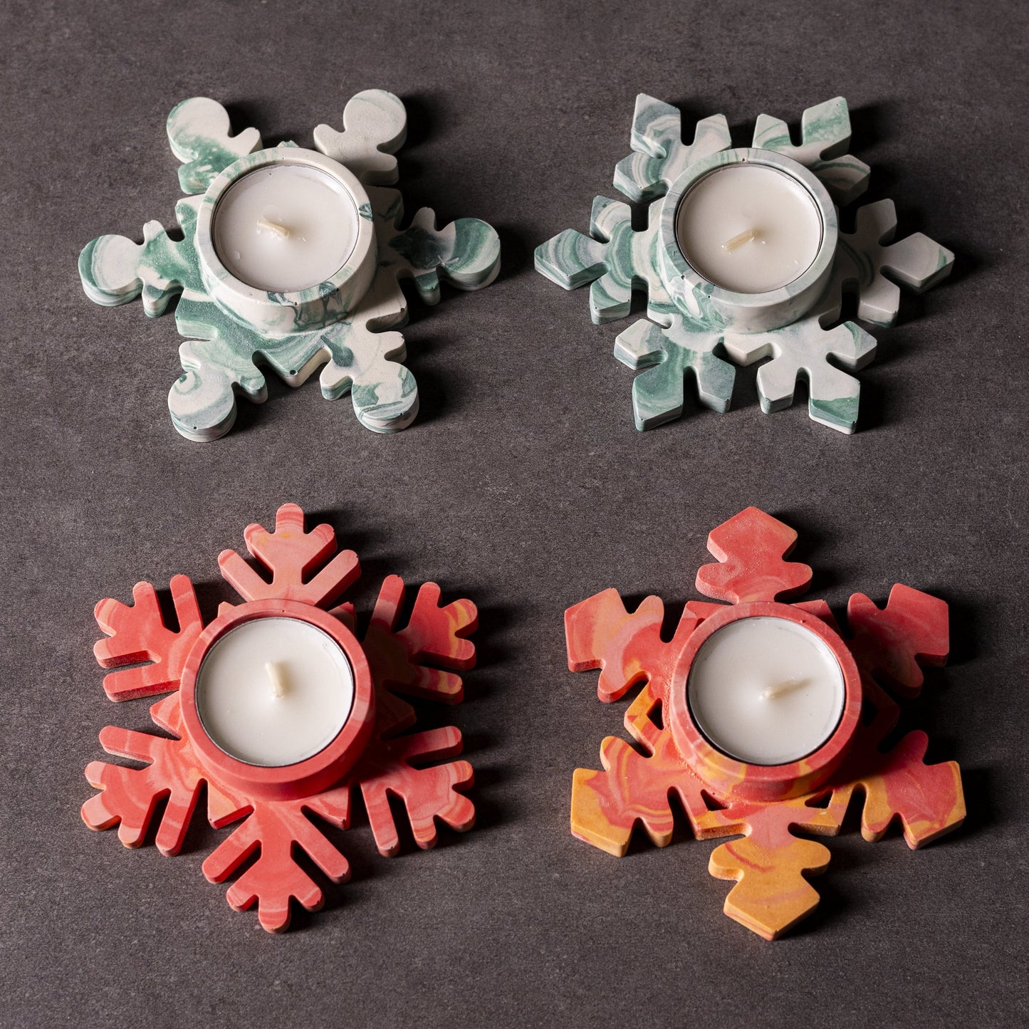Set of 4 Handmade white and red/orange marbled snowflake tealight holder in Jesmonite, festive Welsh Christmas gift, eco-friendly and crafted in Wales