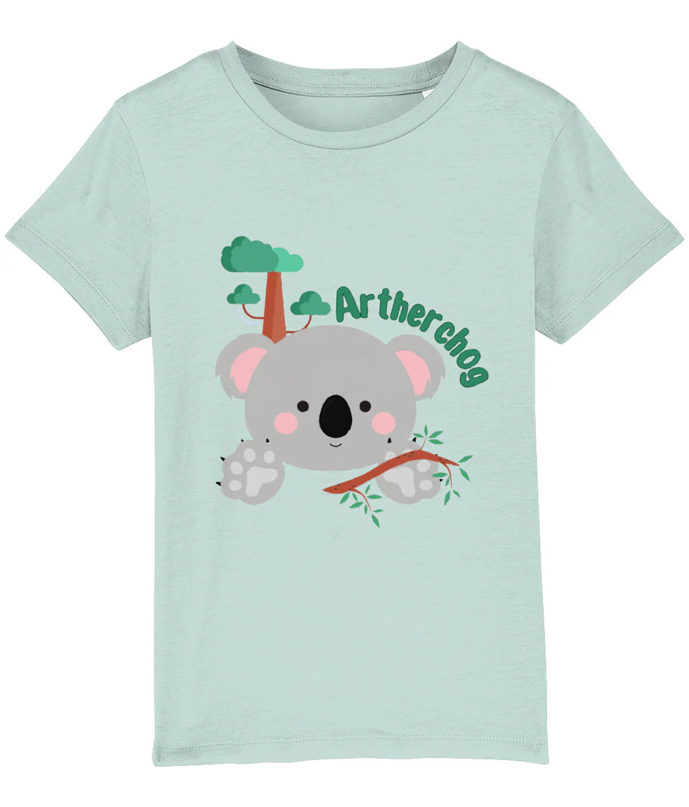 A kids' t-shirt featuring an illustrated lion design, hung up on a wooden hanger. Perfect for new baby and toddler gifts, birthdays, school days, playtime or thoughtful Welsh gifts for children.