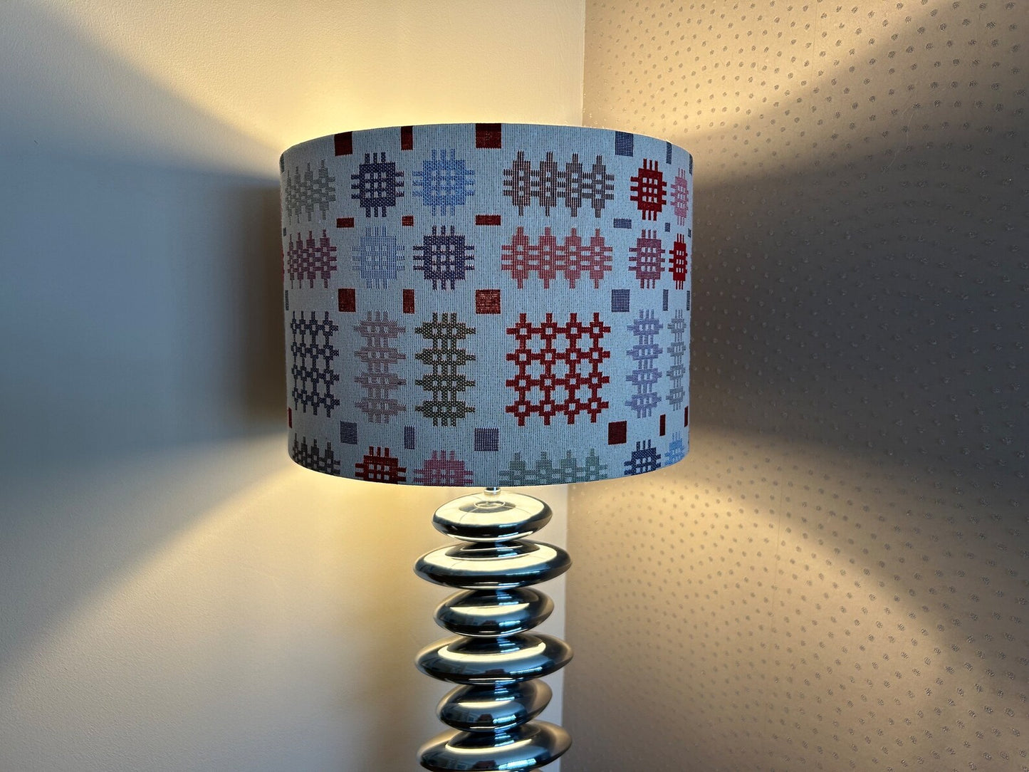 Handmade Welsh tapestry lampshade with vibrant traditional fabric, suitable for pendant, table, or floor lamps.