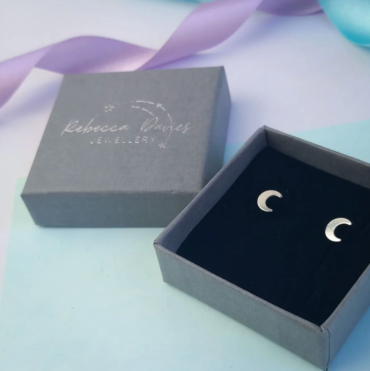 Small sterling silver moon studs, eco-friendly handmade jewellery from an independent Welsh maker