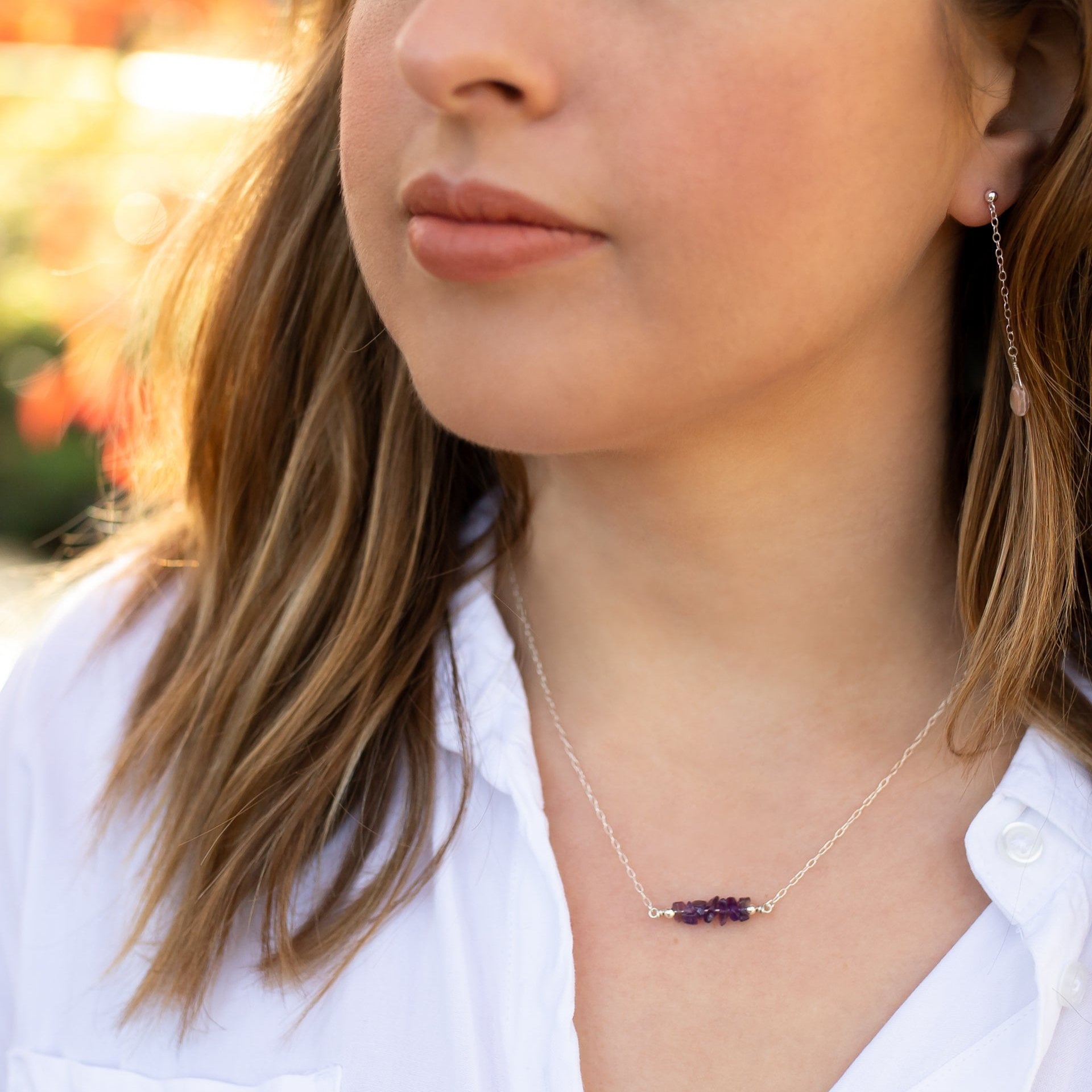 Purple handmade Amethyst Crystals Necklace on silver chain, featured on model