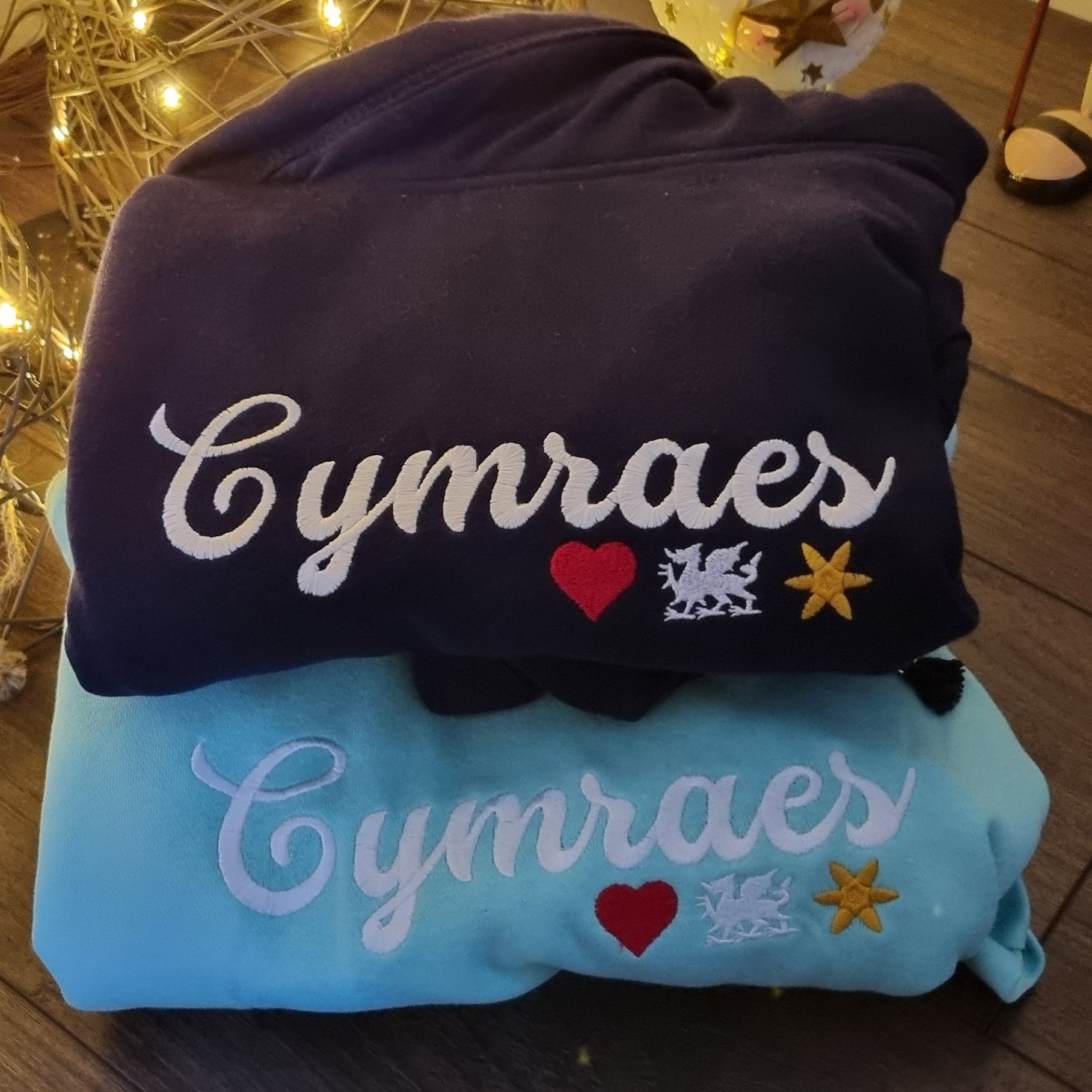 Cymraes Cross-Neck Hoodie – the perfect Welsh-inspired gift for any proud Welsh woman.