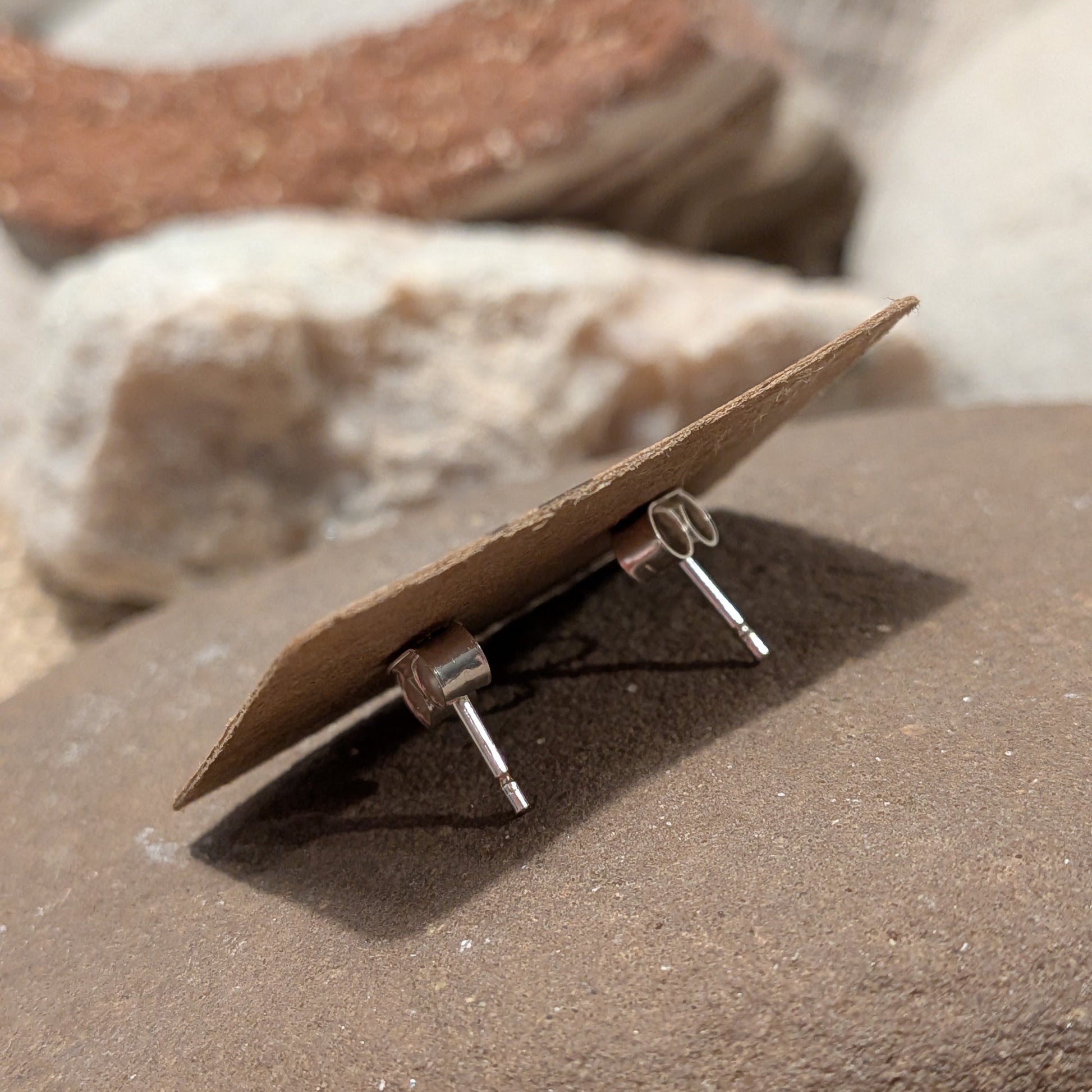 Small recycled sterling silver daffodil stud earrings handmade in Wales