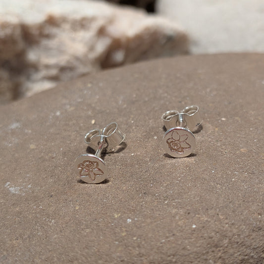Small recycled sterling silver daffodil stud earrings handmade in Wales