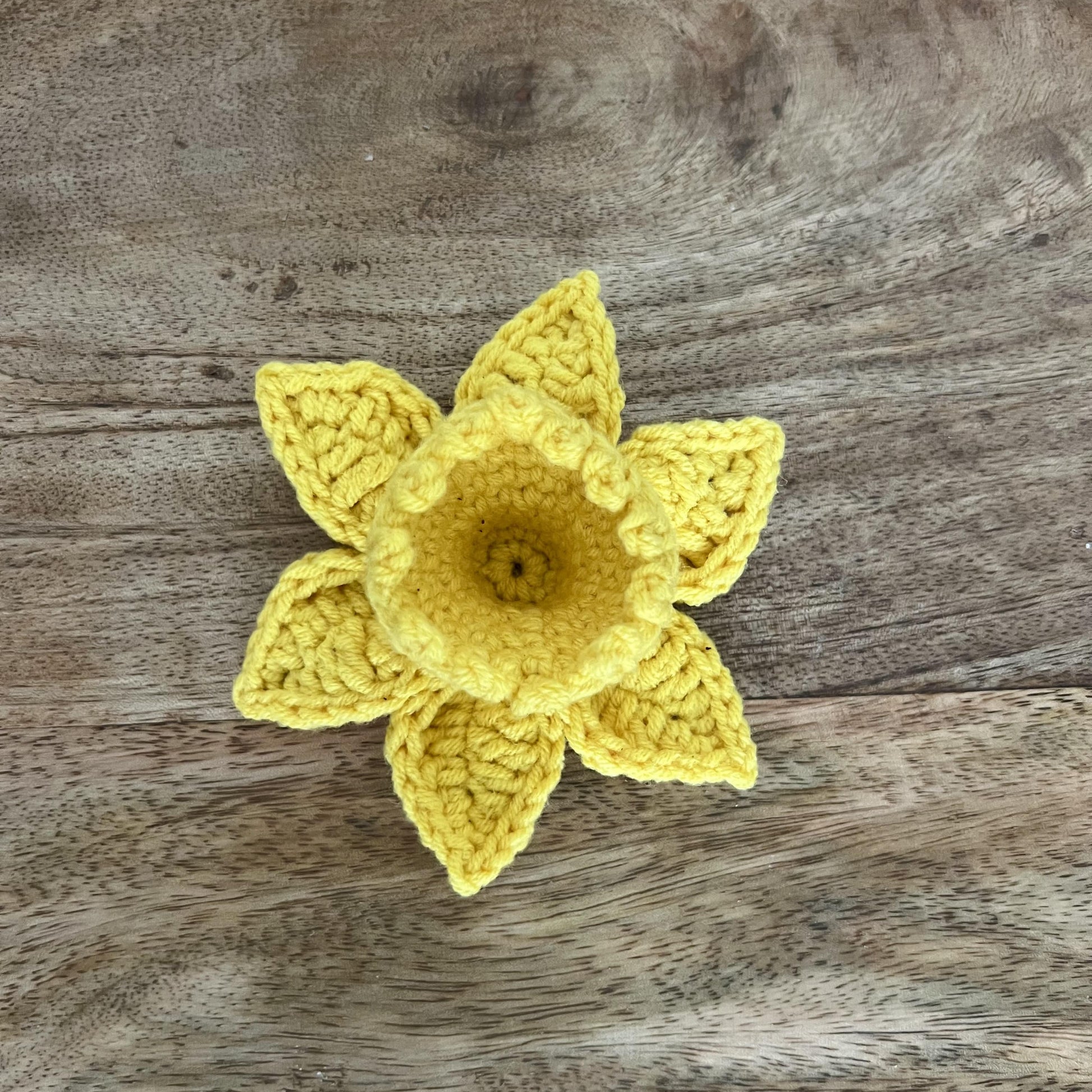 Yellow Welsh Crocheted Daffodil Badge displayed for gift-giving, St David’s Day, or Welsh keepsake.