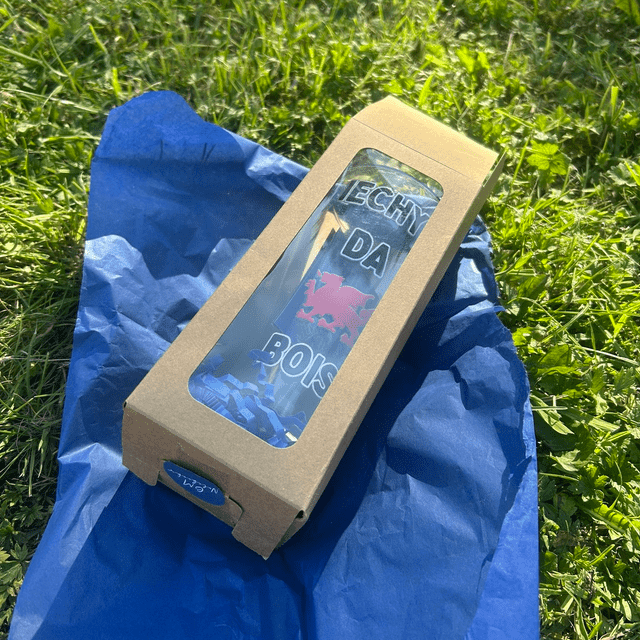 Welsh language pint glass celebrating Cymru heritage and humour, gift made in Wales.