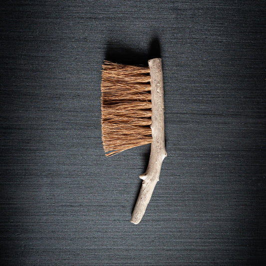 Handcrafted driftwood household brush with coconut fibre bristles, made in wales.