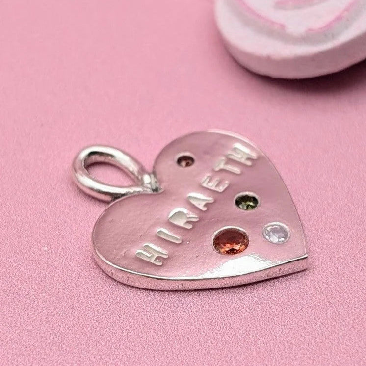 Close-up of Hiraeth Welsh Heart Necklace with colourful cubic zirconia gemstones, handcrafted in Wales, ideal gift for loved ones