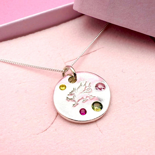 Handmade silver Welsh dragon necklace with colourful gemstones, crafted in Wales.