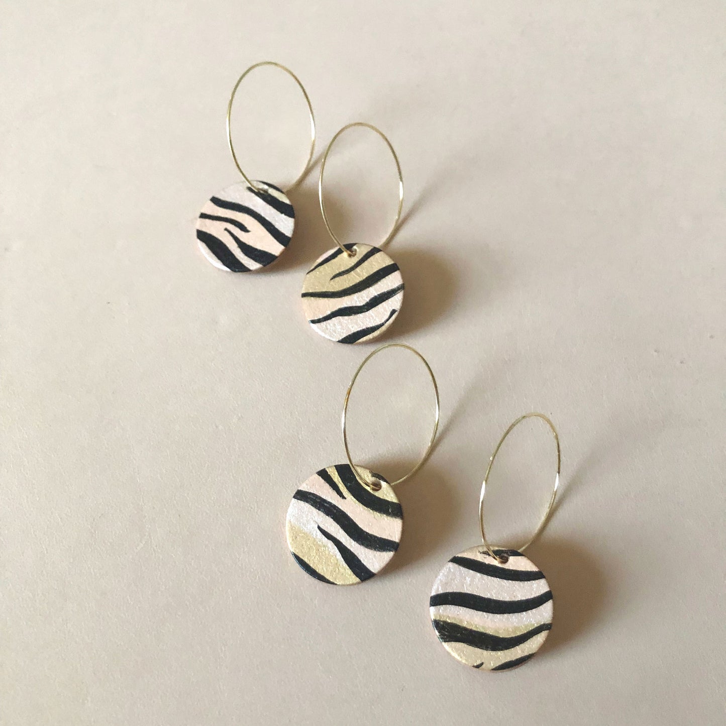 Lightweight vegan leather tiger hoop earrings, handmade in Wales.