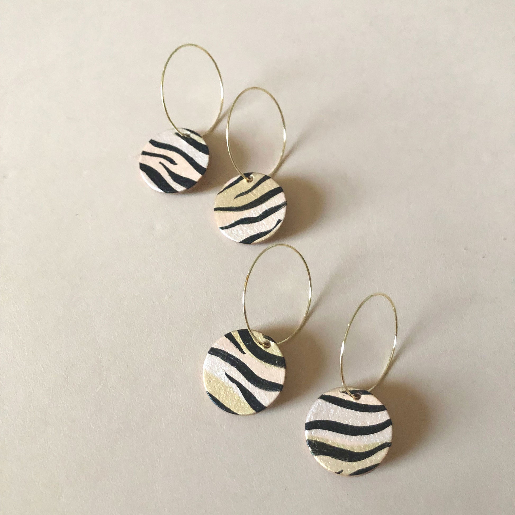 Lightweight vegan leather tiger hoop earrings, handmade in Wales.