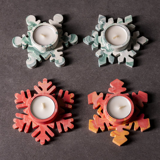 Set of 4 Handmade white and red/orange marbled snowflake tealight holder in Jesmonite, festive Welsh Christmas gift, eco-friendly and crafted in Wales