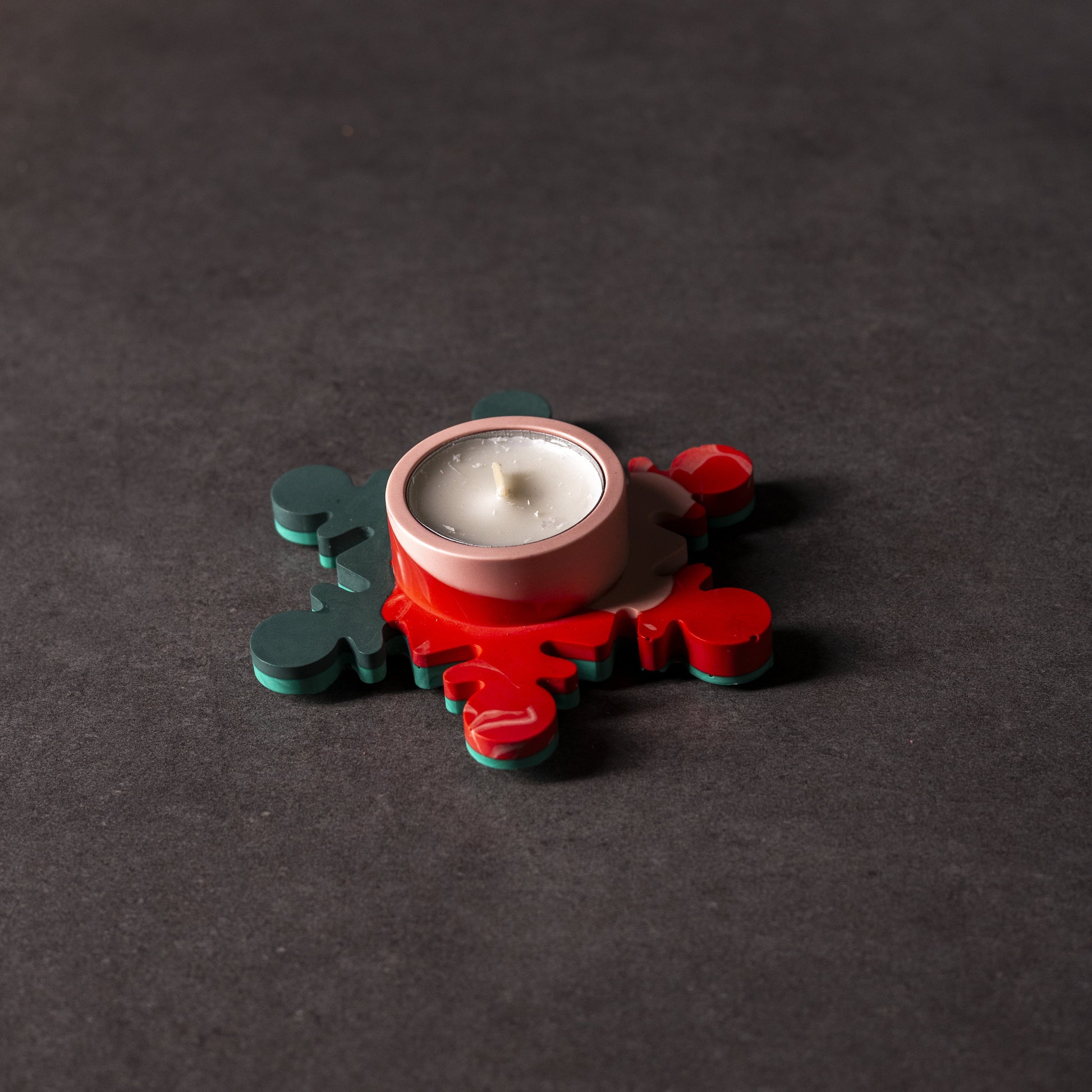 Red and green Christmas themed handmade snowflake tealight holder, festive Christmas gift made in Wales, eco-friendly and handcrafted