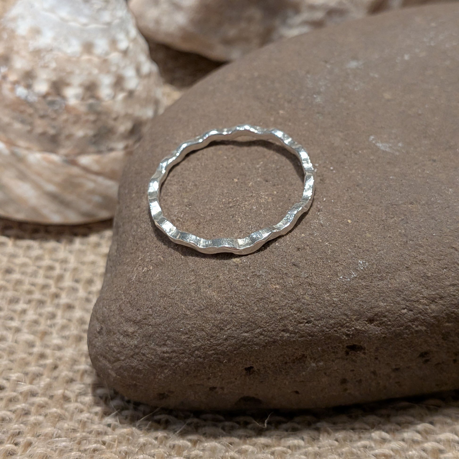 Minimalist wavy stacking ring in hammered recycled sterling silver. Perfect gift for jewellery lovers, made in Wales.