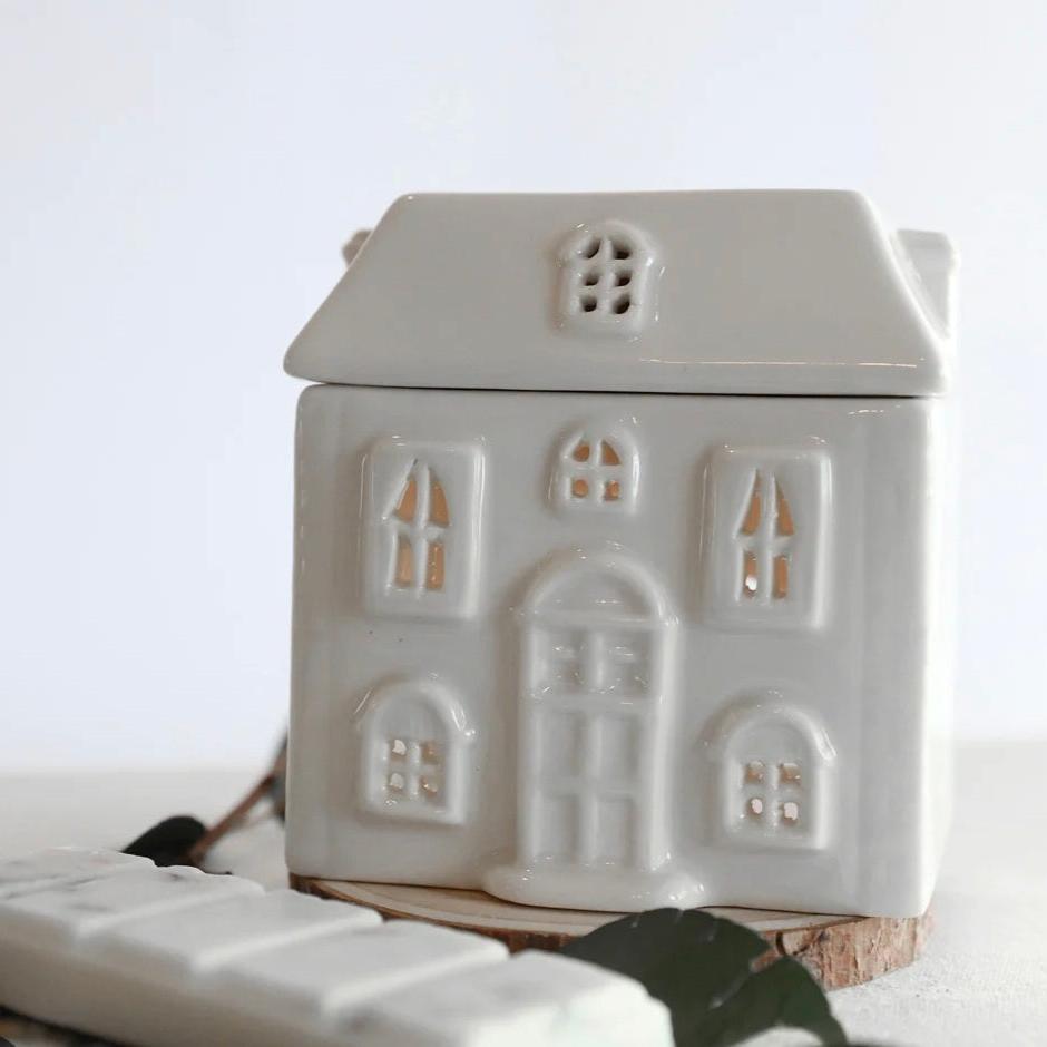 White house wax burner against a plain white background, made by local, Welsh, small business