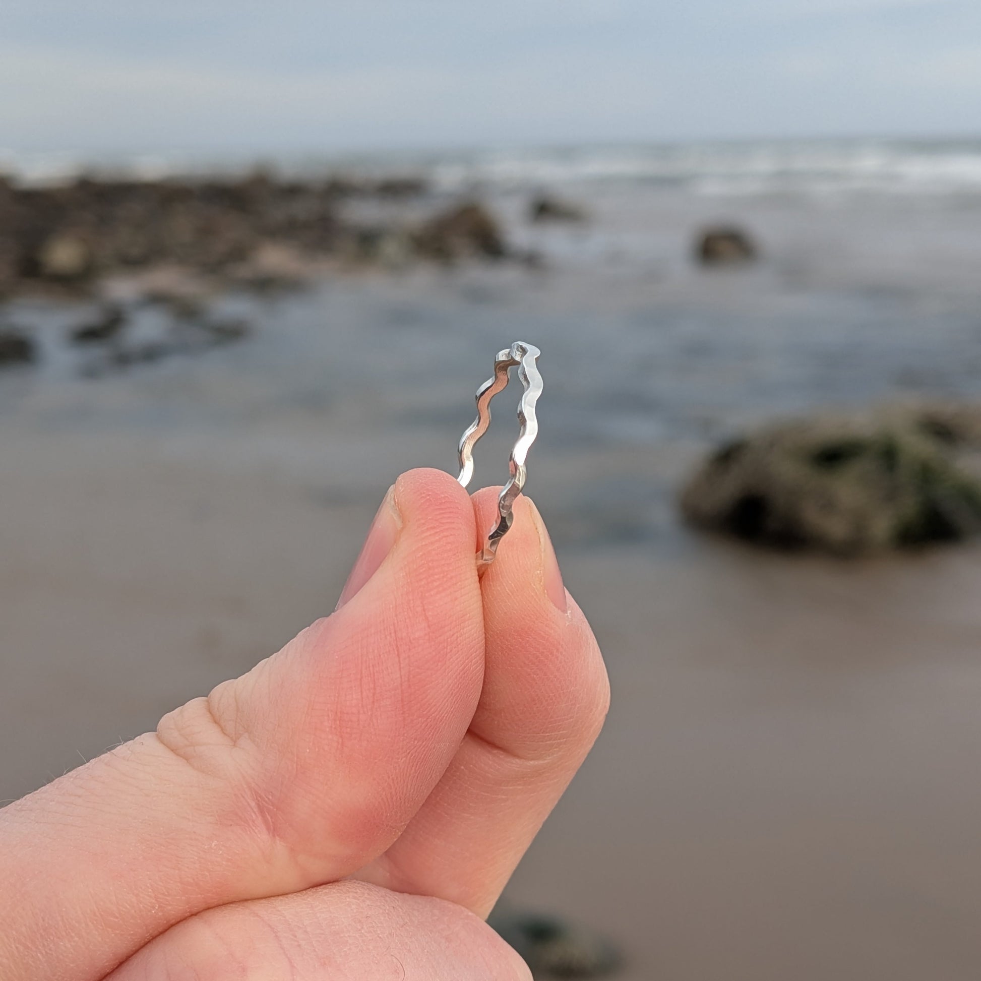 Eco-friendly Welsh handmade silver ring with organic wavy design. Made in Wales, inspired by the sea. Perfect for jewellery lovers, made in Wales.