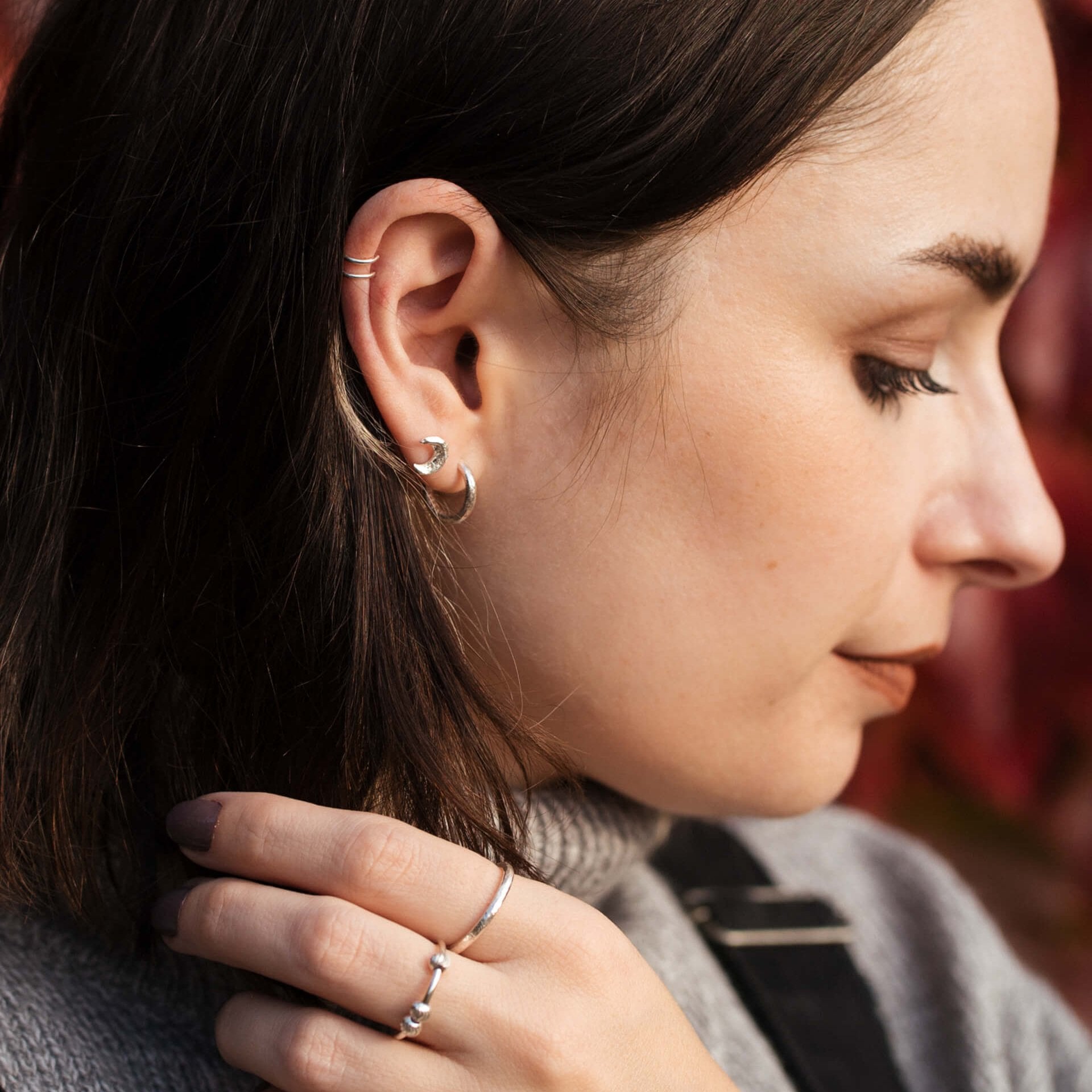 Sustainable recycled sterling silver ear cuff on model