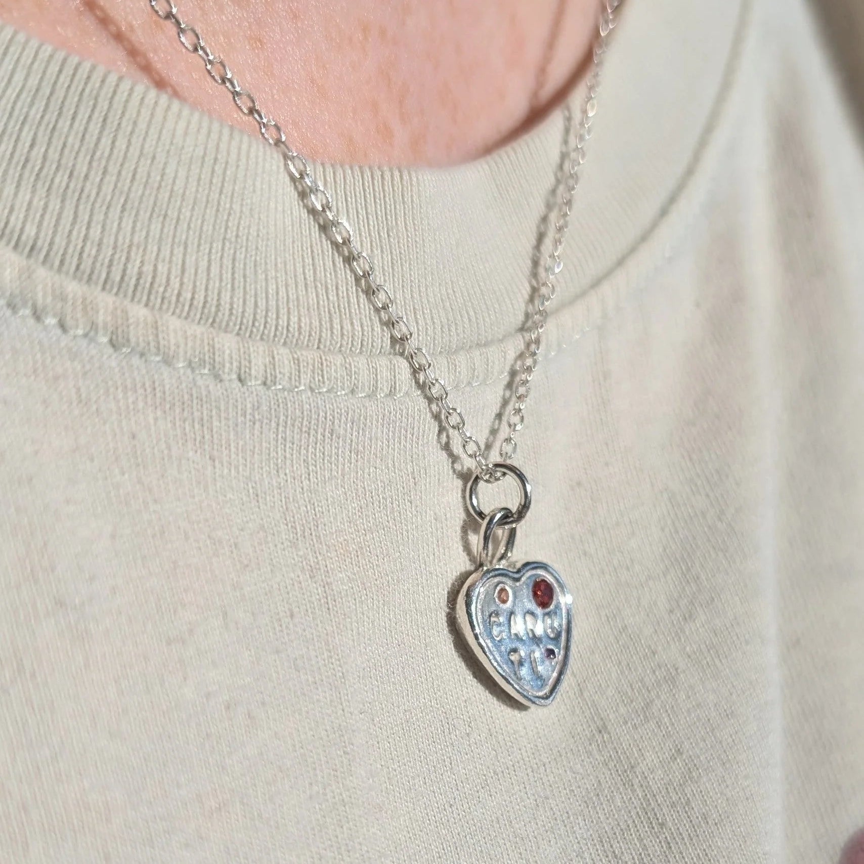 Handmade Caru Ti Sweetheart Necklace in silver with three colourful cubic zirconia gemstones, celebrating Welsh heritage.