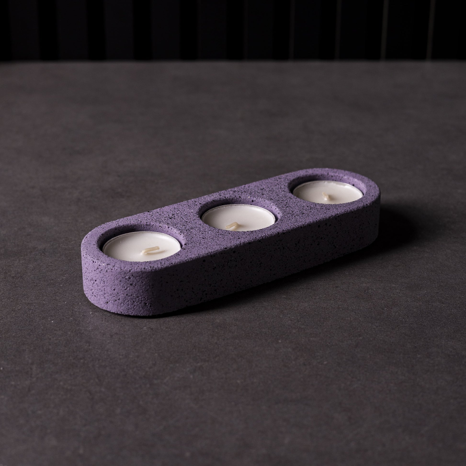 Handmade triple tealight candle holder in vibrant purple colours from Wales