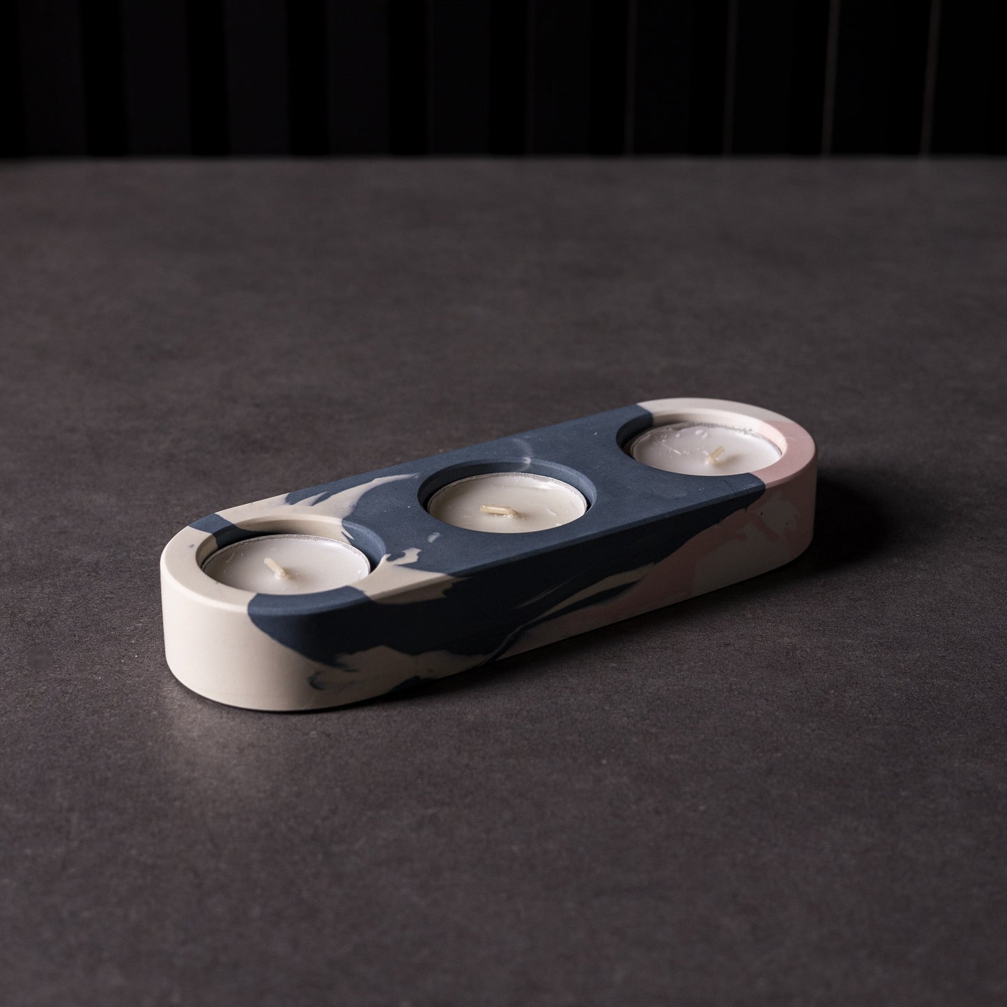 Jesmonite triple candle holder in blue, white and pink. Made in Wales. Perfect for gifting