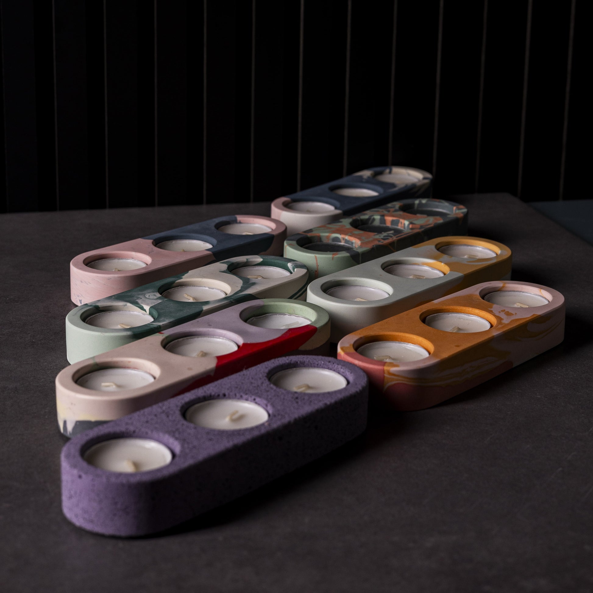 Handmade triple tealight candle holders in vibrant colours from Wales.