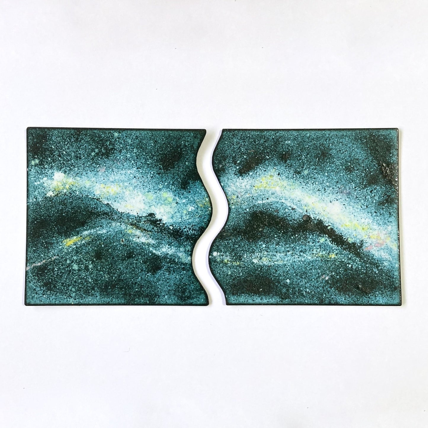 Cosmic Milky Way coaster set made from hand-enamelled copper, fitting together as one piece.