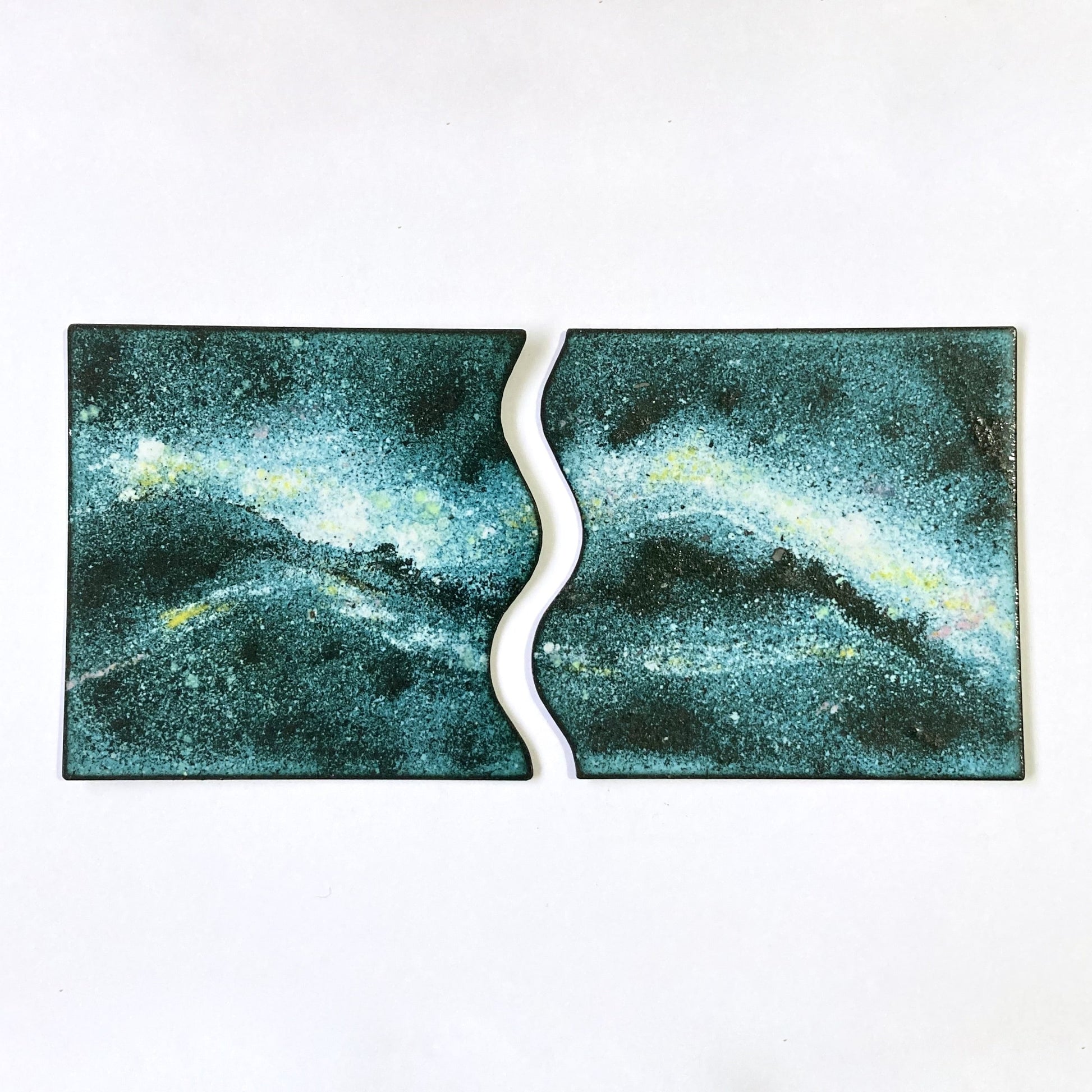 Cosmic Milky Way coaster set made from hand-enamelled copper, fitting together as one piece.
