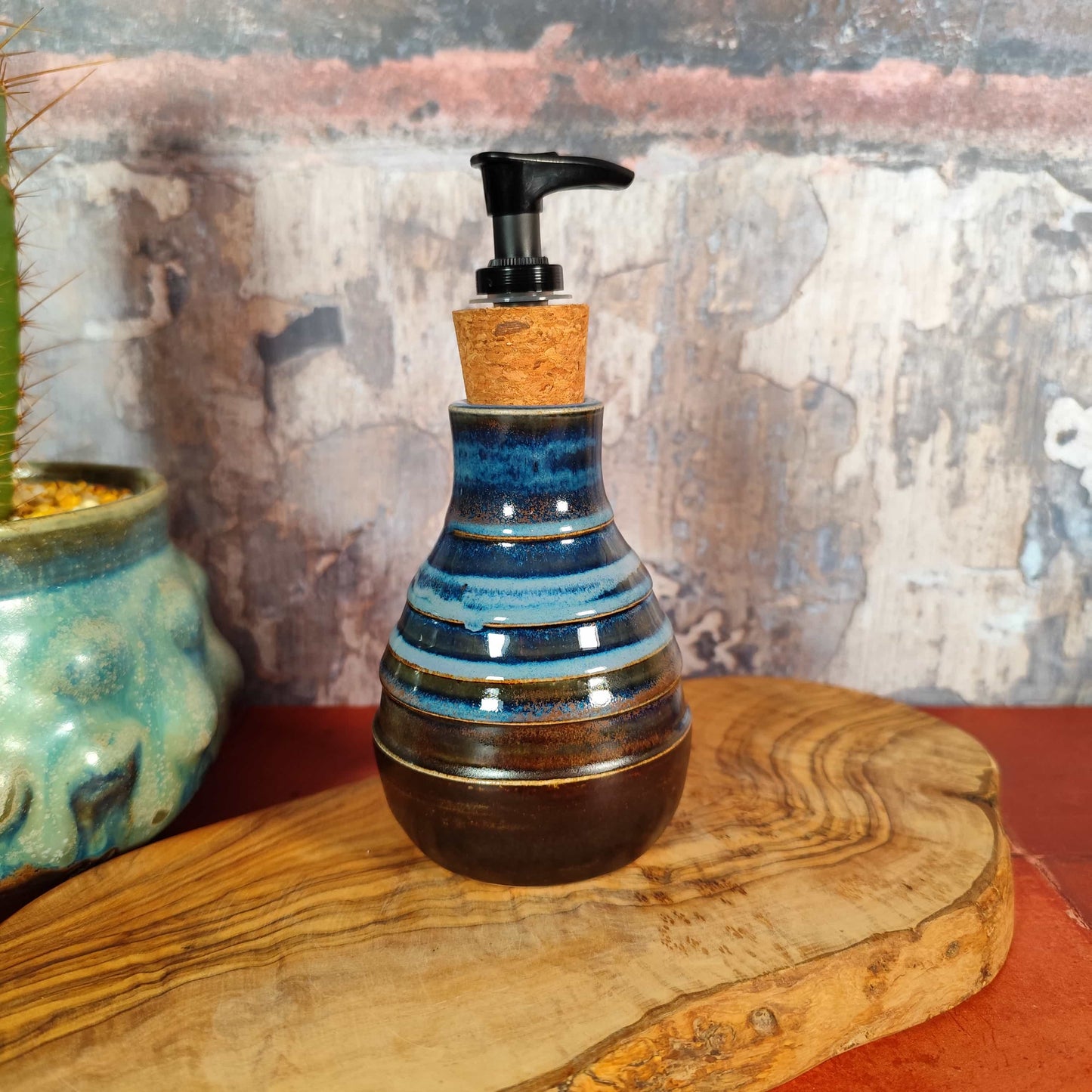 Dark blue handmade ceramic soap dispenser made in Wales