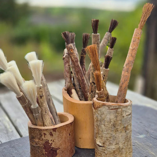 Handmade natural fibre paintbrush with driftwood handle