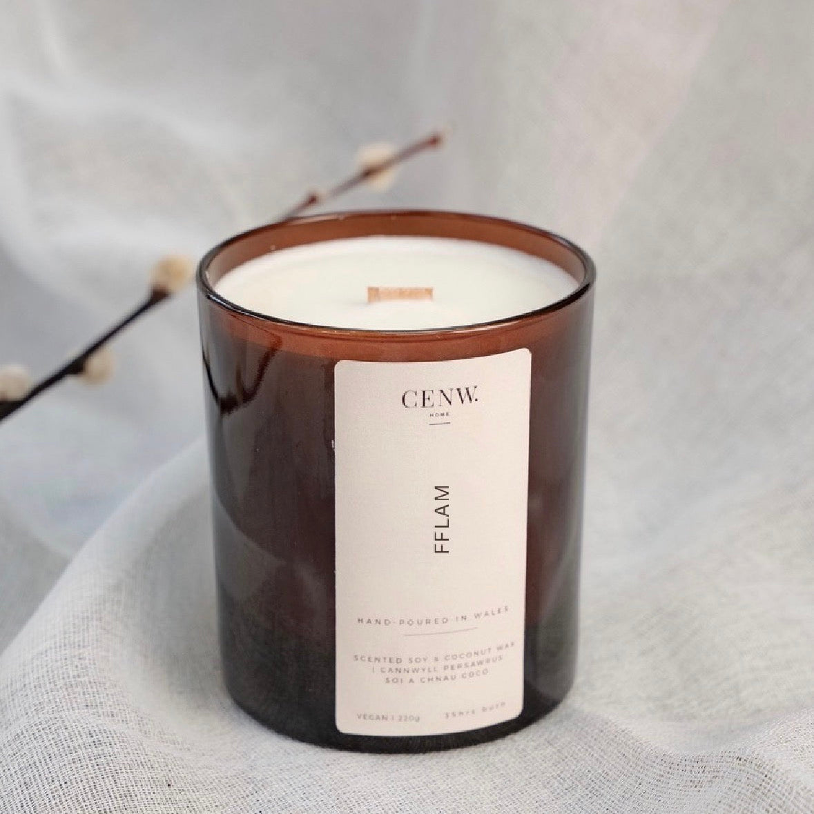 Vegan soy wax candle with warm vanilla and patchouli scent.