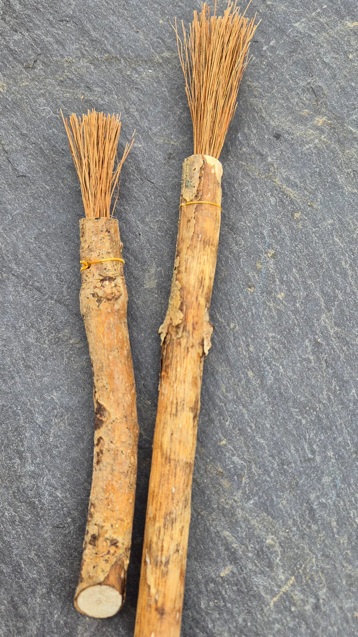 Handmade natural fibre paintbrush with driftwood handle