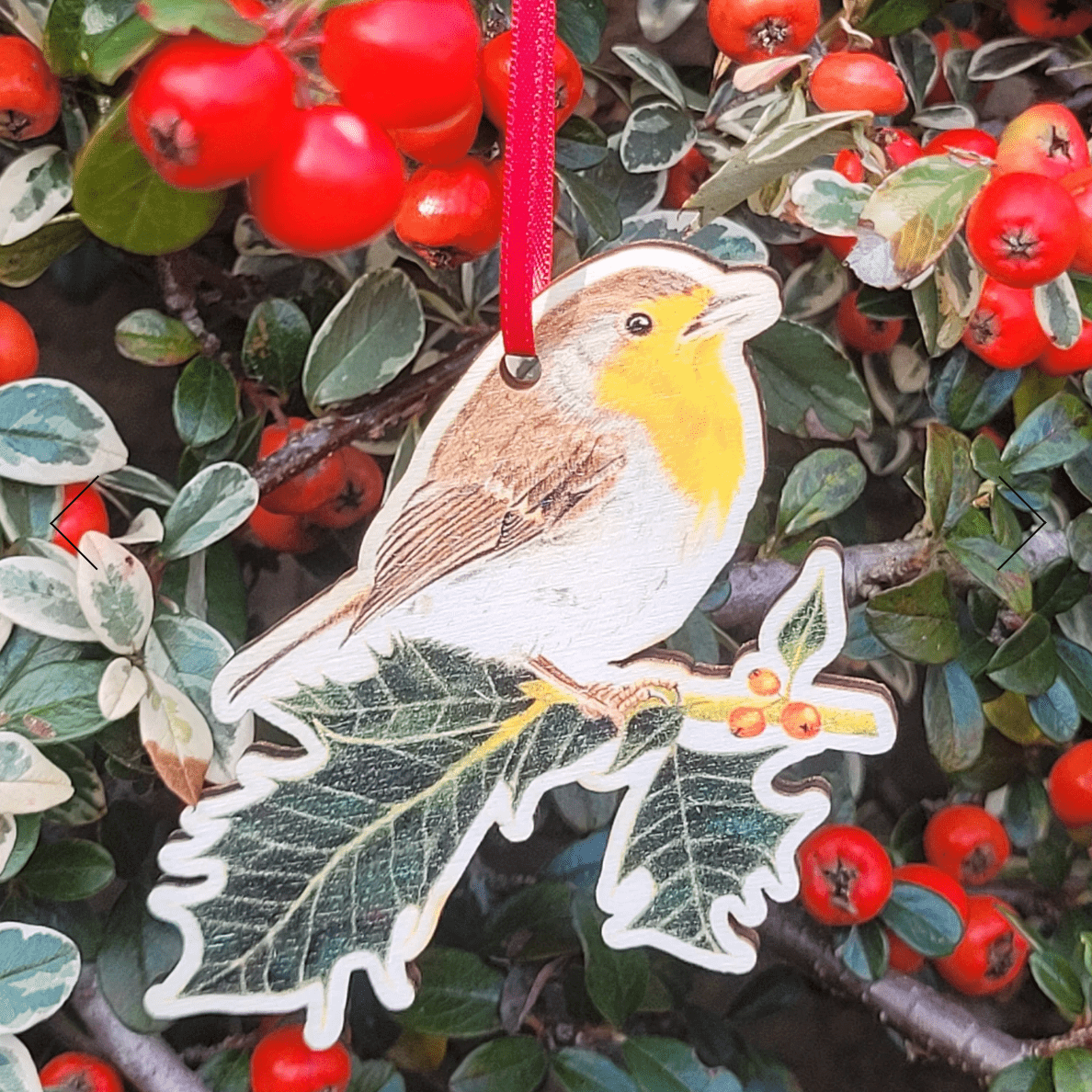 Handmade robin on holly wooden Christmas decoration, FSC certified, made by Welsh small business”