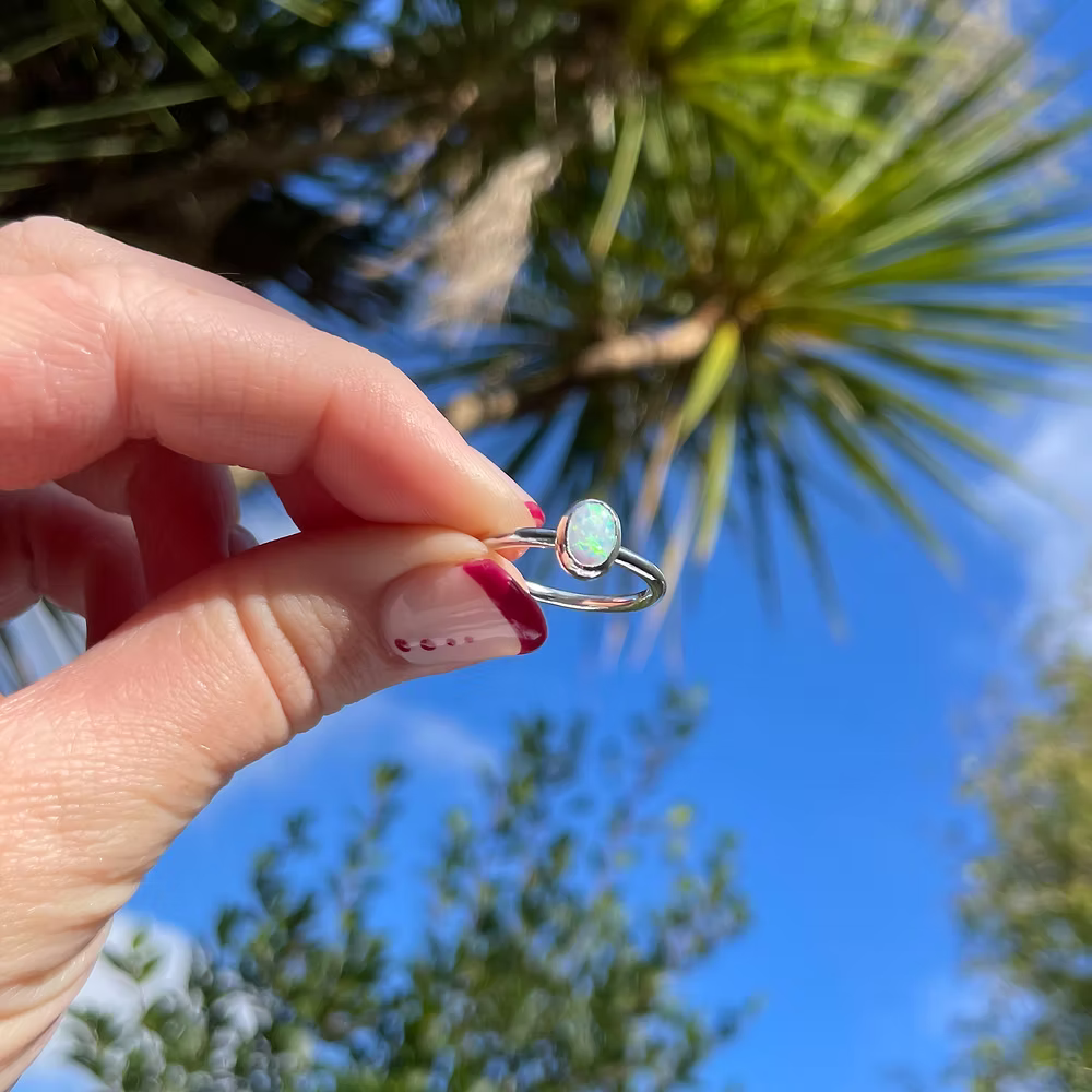 Handmade sterling silver ring with lab-grown 8x6mm opal on 2mm band