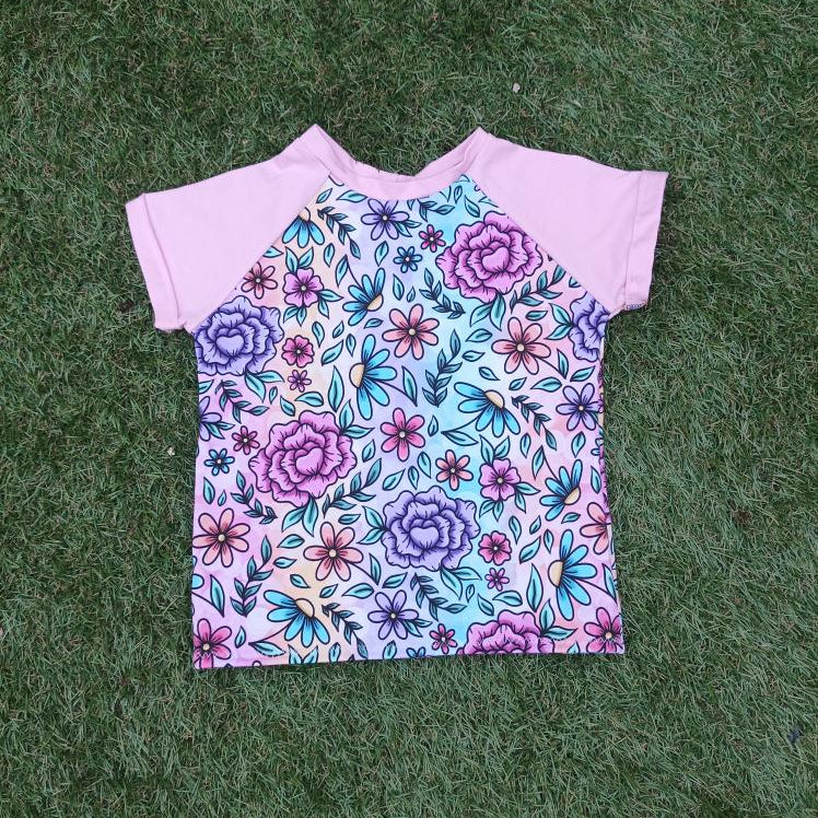 Children's t-shirt with floral pattern. Handmade Welsh children’s clothing.