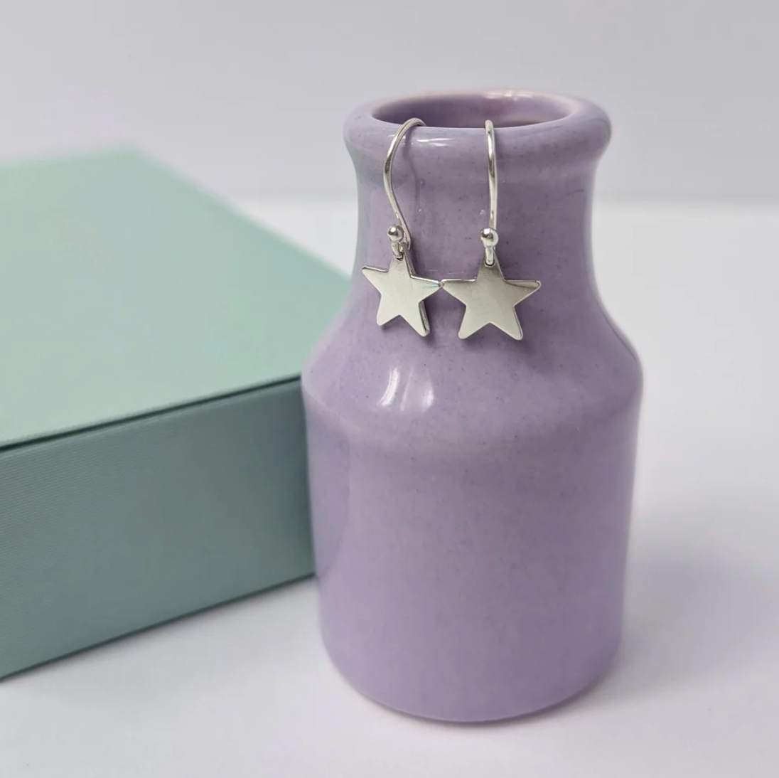 Delicate artisan 925 silver star earrings, lightweight and individually crafted, ideal for Christmas or birthday gifts.