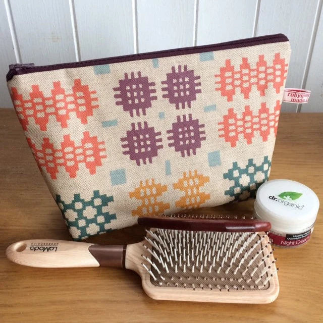 Colourful carthen print oilcloth wash bag for travel and everyday use. perfect christmas gift.